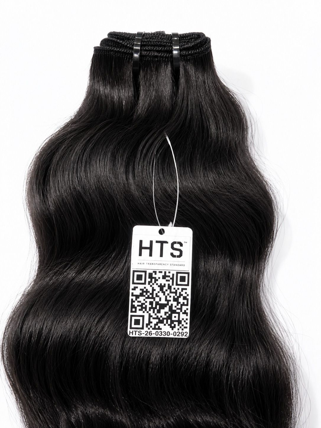QC technicians inspecting hair bundles